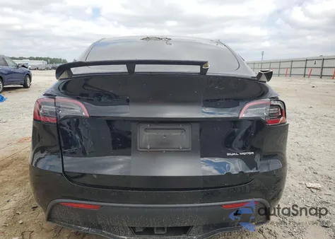 2024 Tesla Model Y from USA, damaged, VIN 7SAYGDEE7RA323373